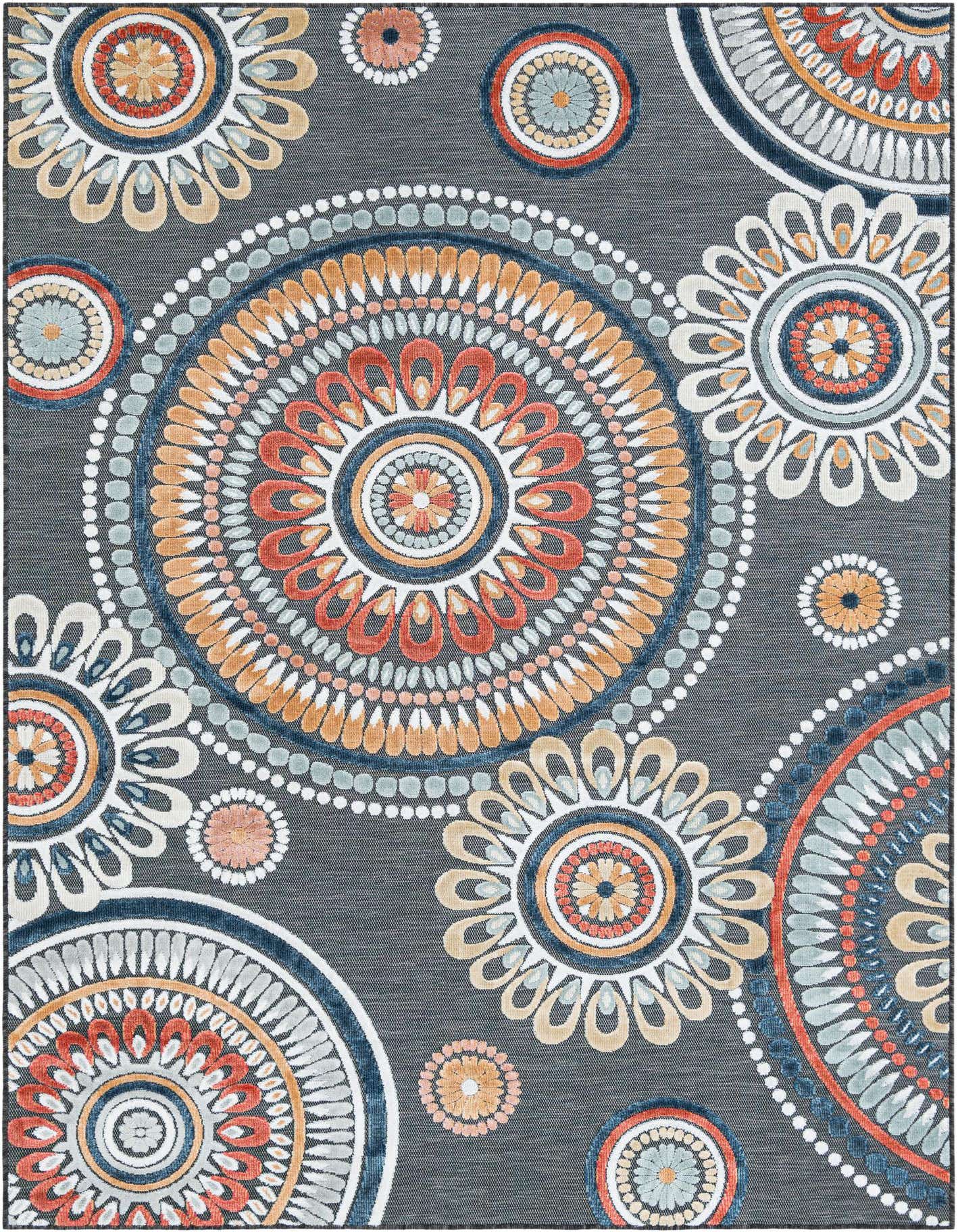 A 6x9 rectangular indoor/outdoor rug with a dark gray background and large, colorful abstract floral medallions in orange, blue, and white.