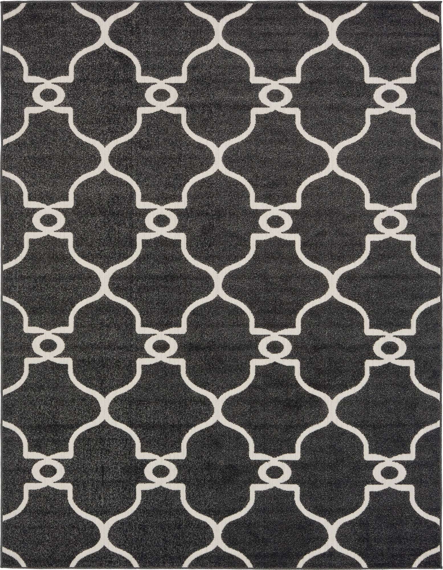 A 6x9 rectangular black indoor/outdoor rug with a repeating white trellis pattern, suitable for a patio or living room.