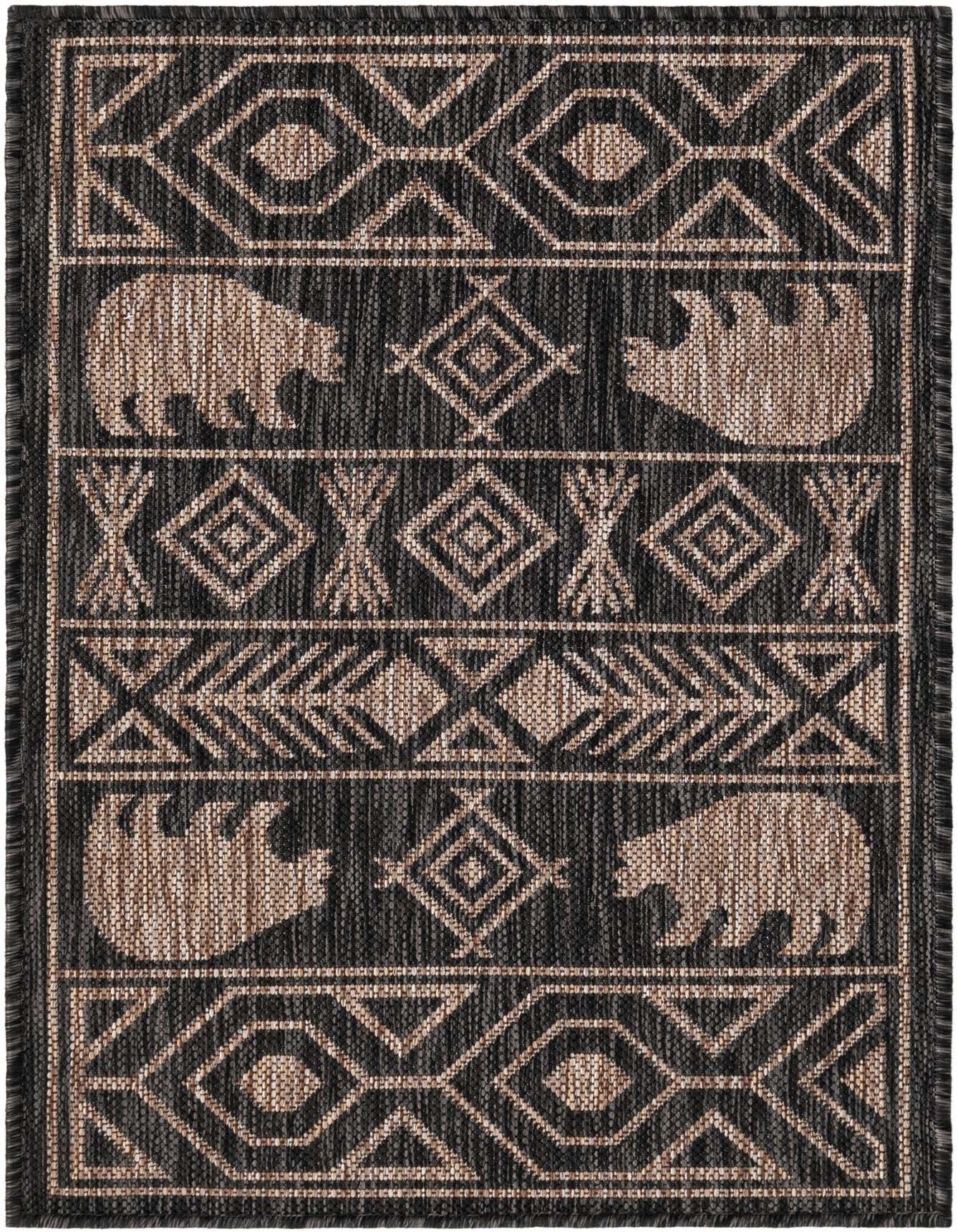 A 2x3 rectangular black and beige flatweave rug with Southwestern tribal patterns and bear motifs, suitable for indoor or outdoor use.