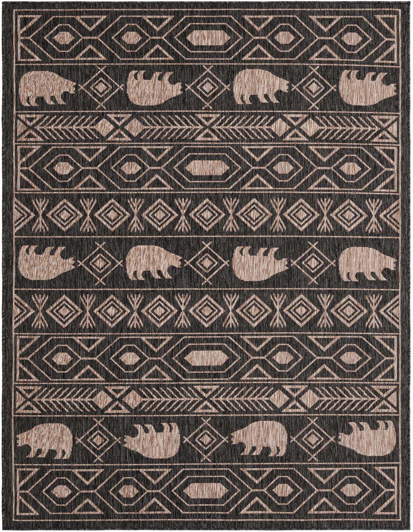 A 5x8 rectangular black and beige Southwestern rug with tribal patterns and bear motifs, suitable for indoor/outdoor use.