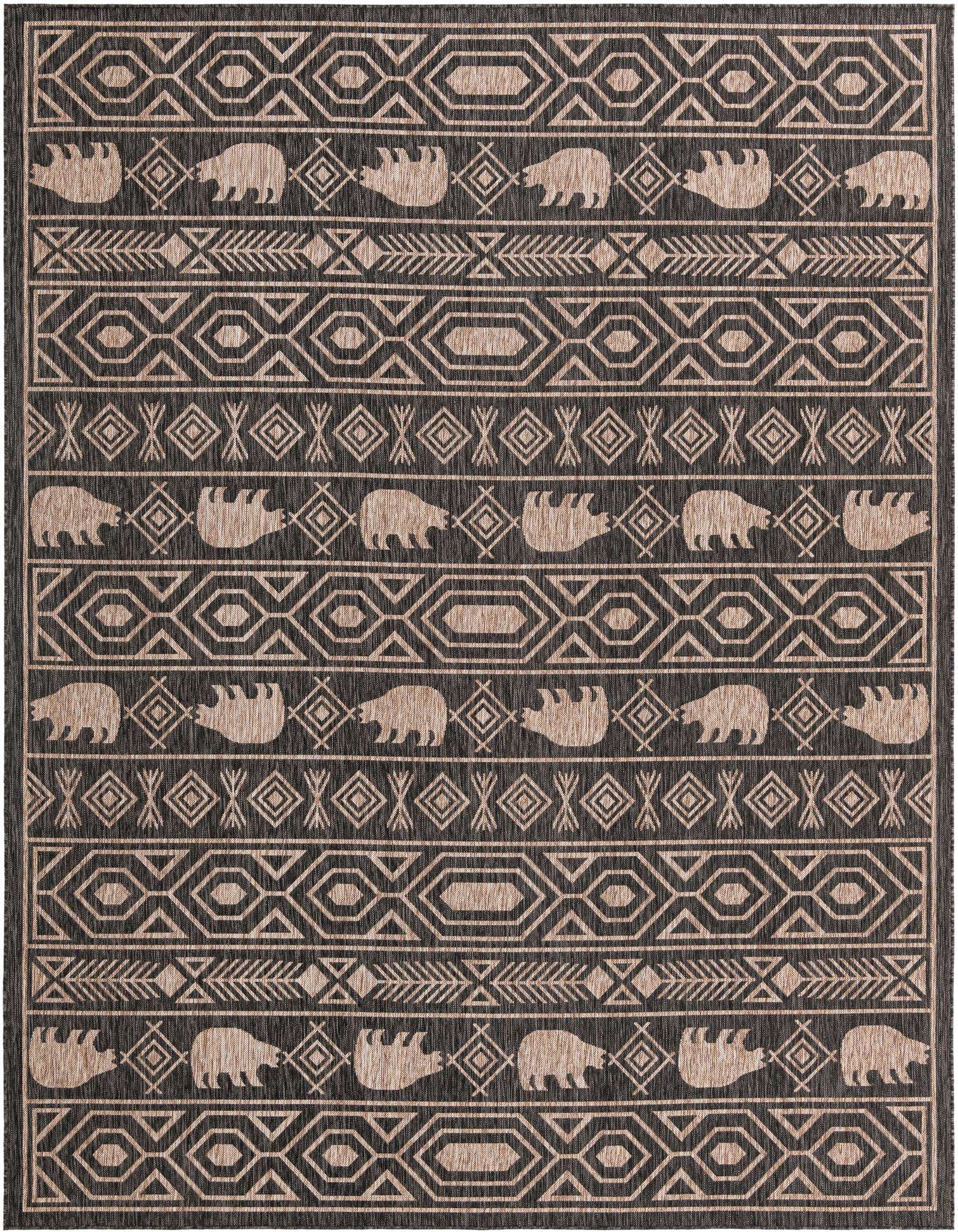 A 9x12 rectangular black and beige tribal rug with bear and geometric patterns, suitable for indoor or outdoor use.