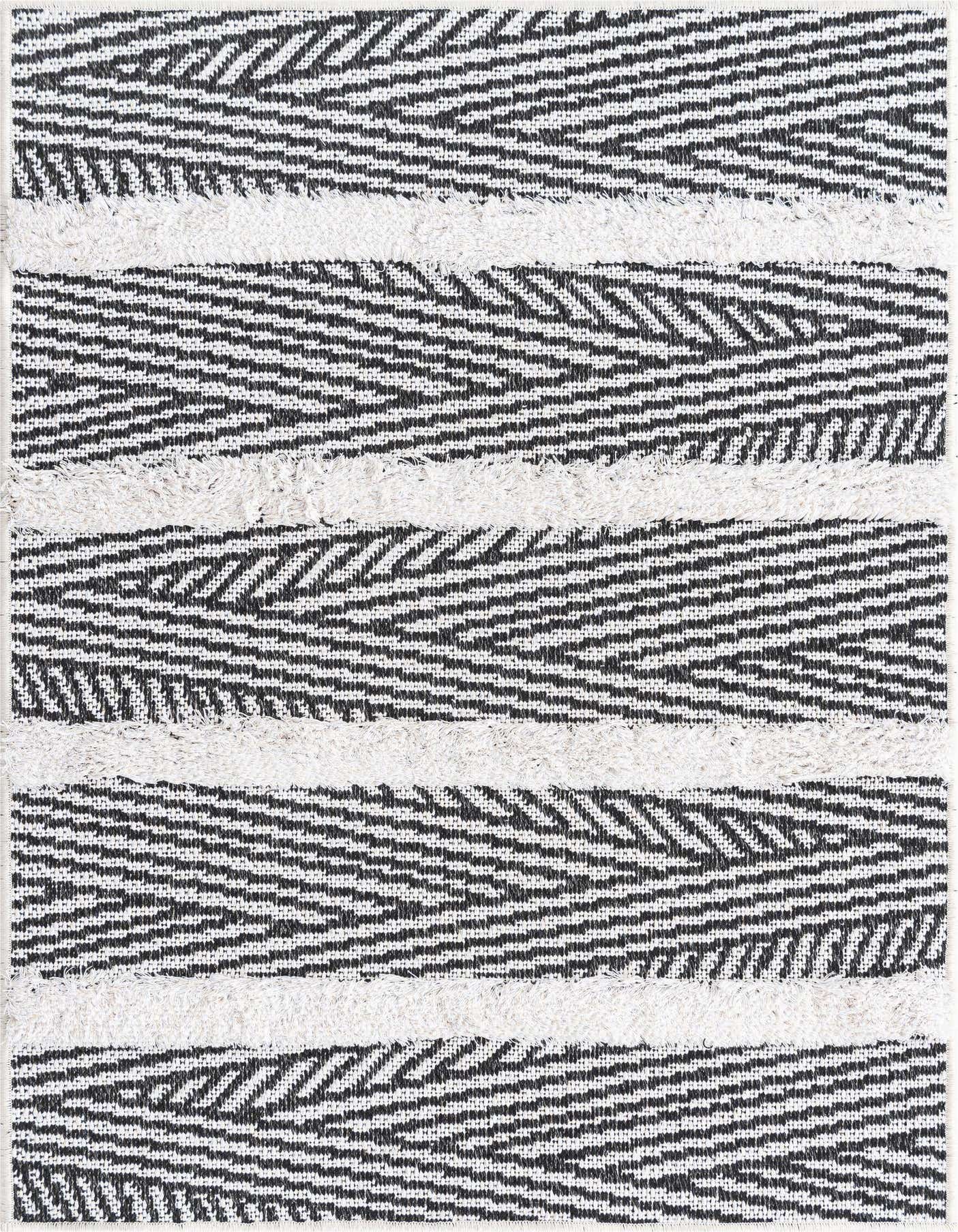 A 2x3 rectangular black and white modern rug with textured stripes, ideal for an indoor space.