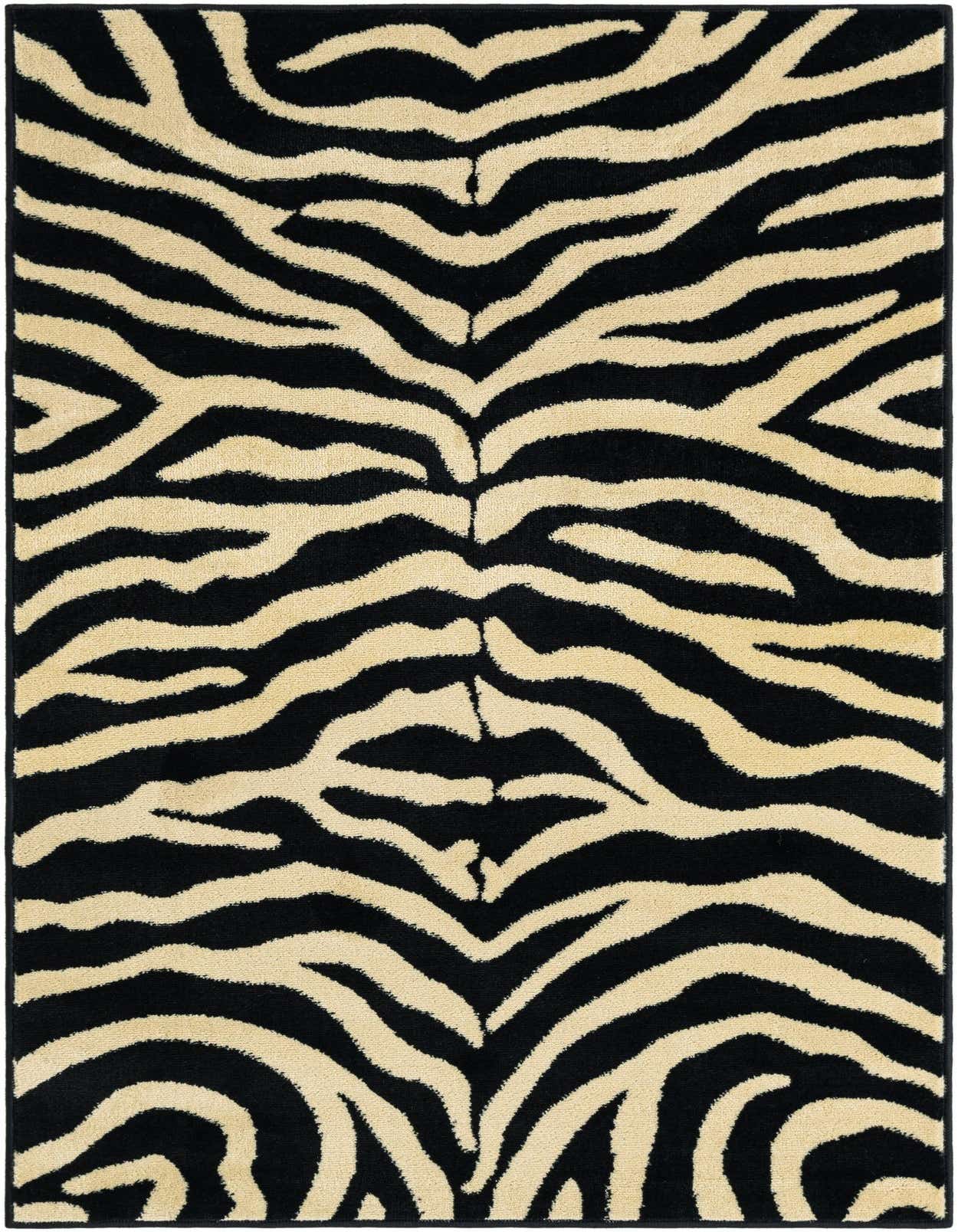 A 3x5 rectangular Savannah rug featuring a bold black and cream zebra stripe pattern, perfect for an entryway.
