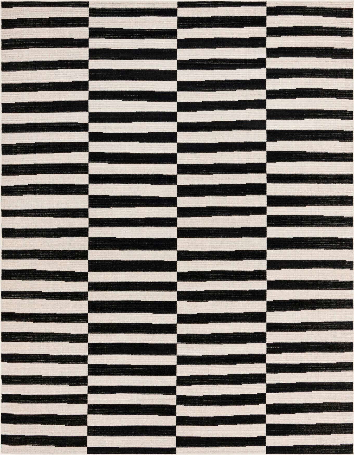 A 4x6 rectangular Rugs.com SoHo rug featuring a modern black and white striped pattern, ideal for a living room.