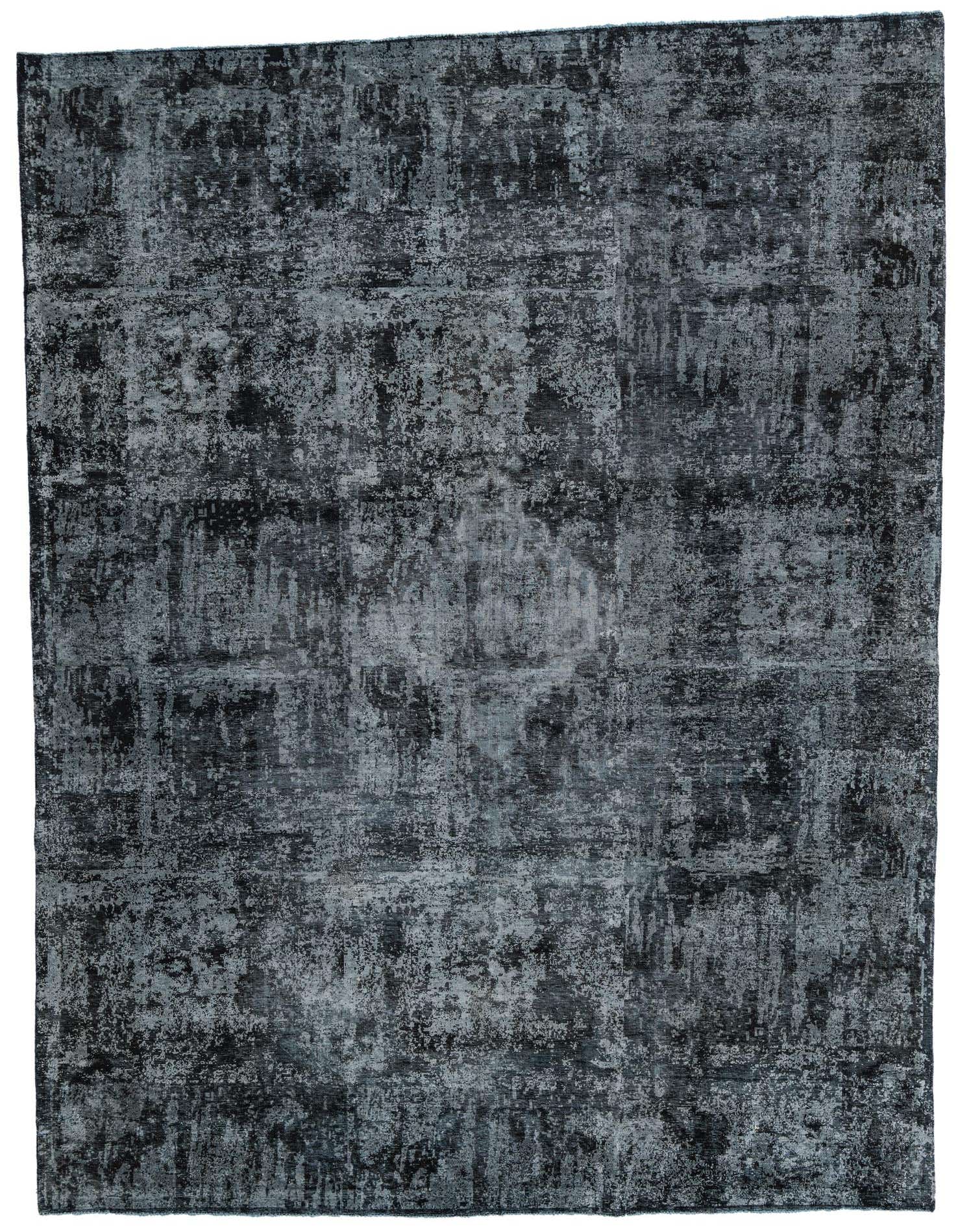 A 9x12 rectangular Ultra Vintage rug in shades of black and dark gray, featuring an abstract, distressed Persian pattern, suitable for a living room.