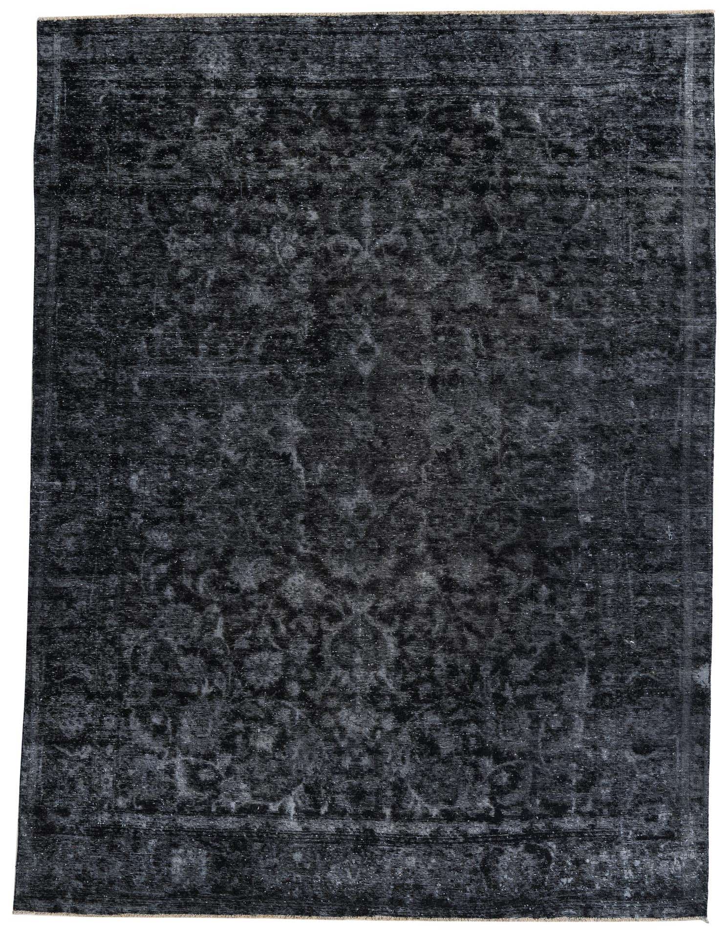 A rectangular 8x11 black wool area rug with a subtle, distressed Persian pattern and flat pile.