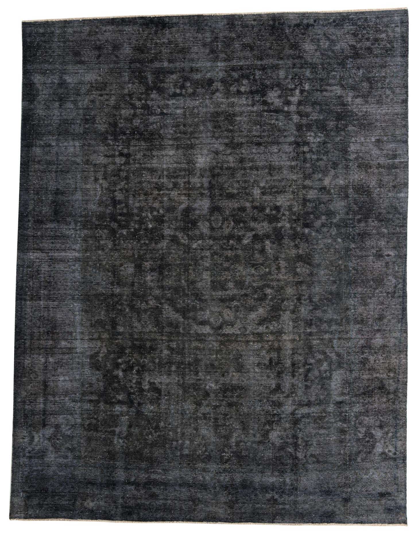 A large 9x12 rectangular black wool rug with a subtle, faded Persian medallion pattern, suitable for a living room.