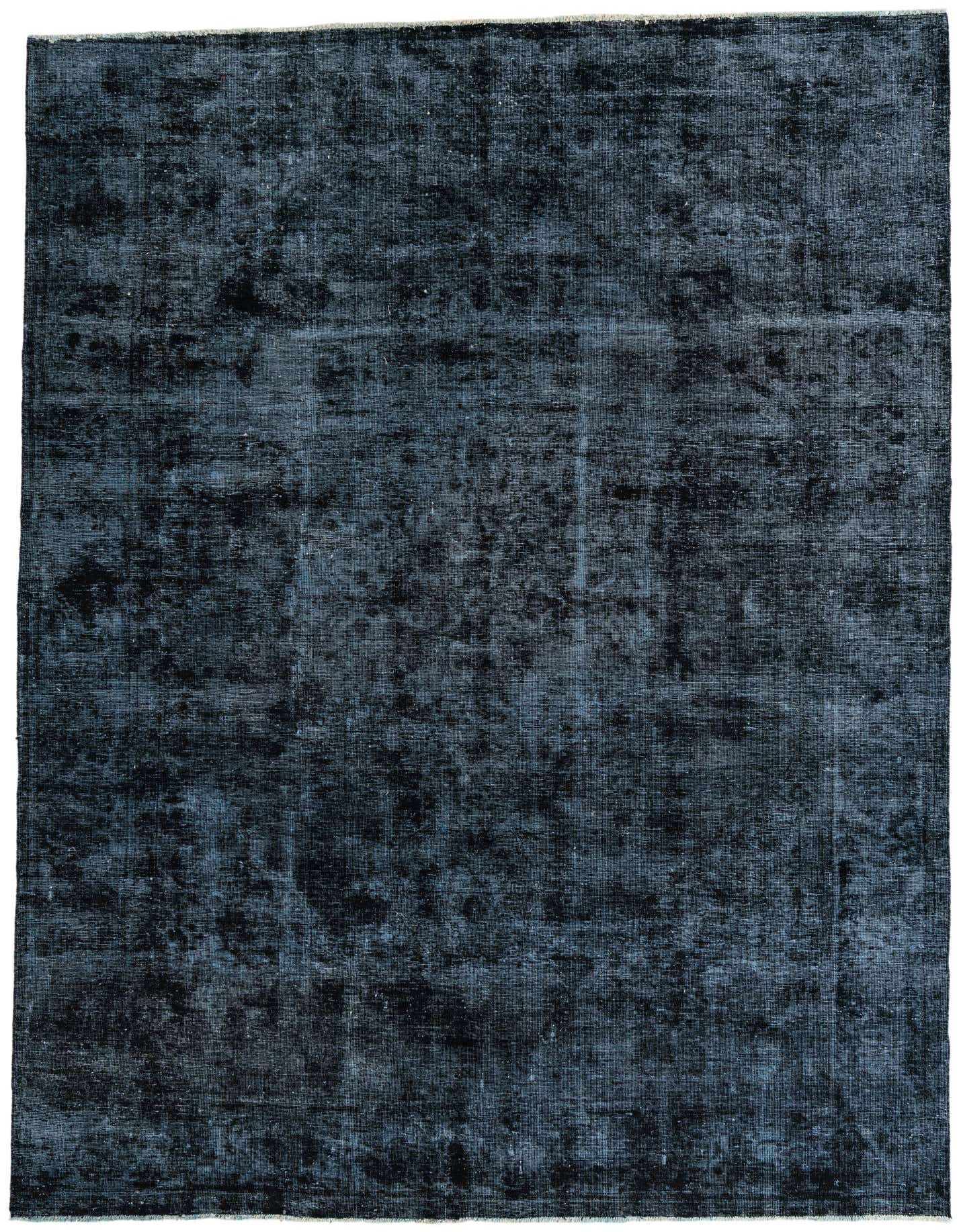 A rectangular 8x11 black wool rug with a subtle, distressed Persian-style pattern, suitable for a living room.