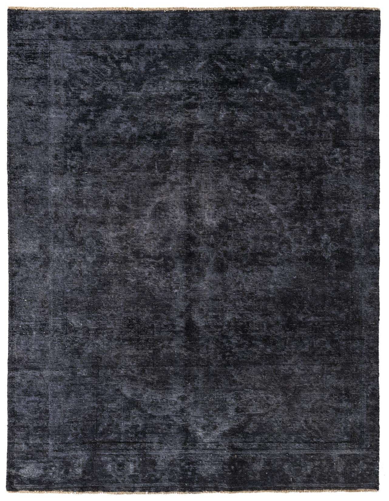 A 6x9 rectangular Rugs.com Ultra Vintage black wool rug with a subtle distressed Persian medallion pattern.
