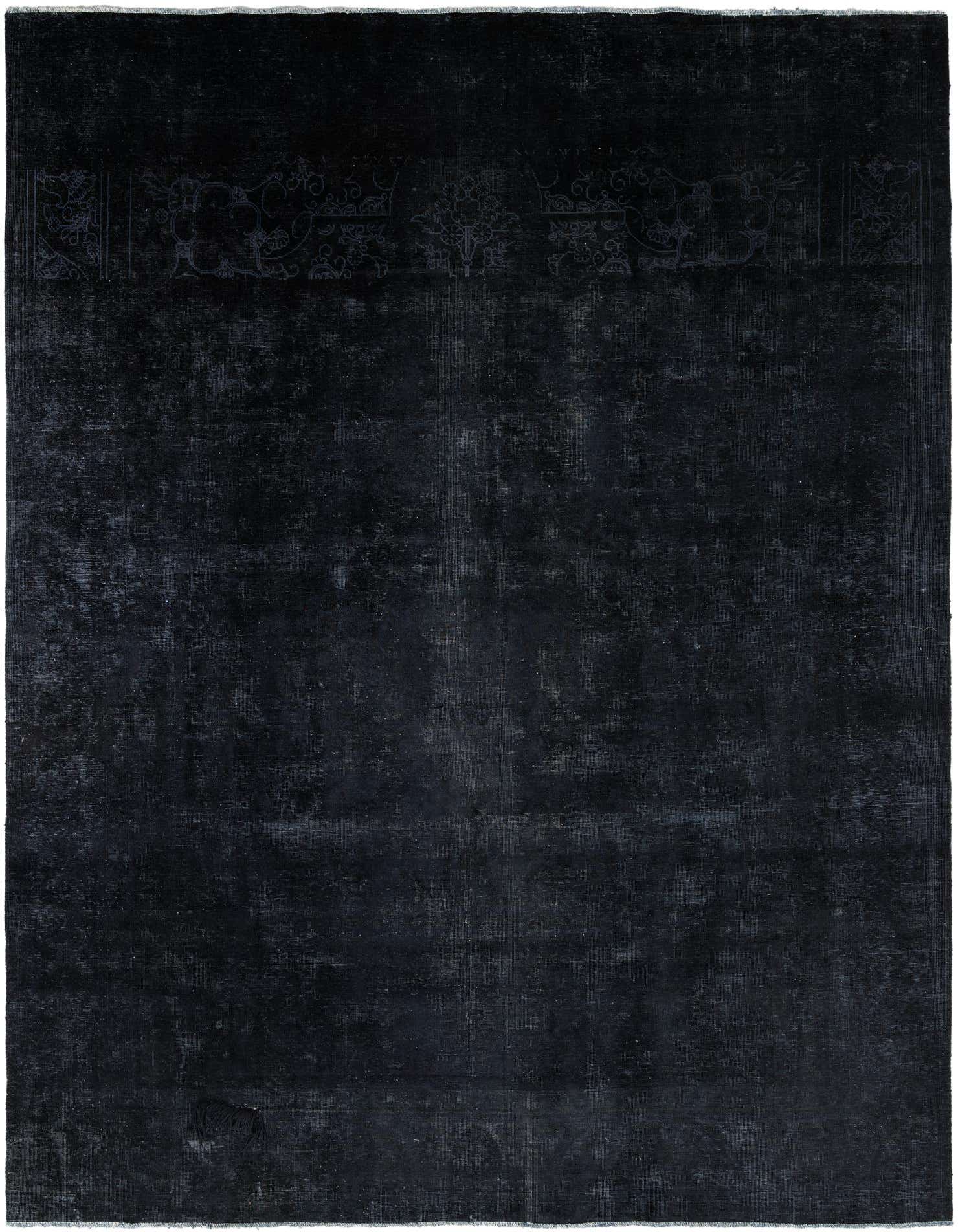 A 9x12 rectangular black wool area rug with a subtle, faded Persian medallion pattern visible at the top.