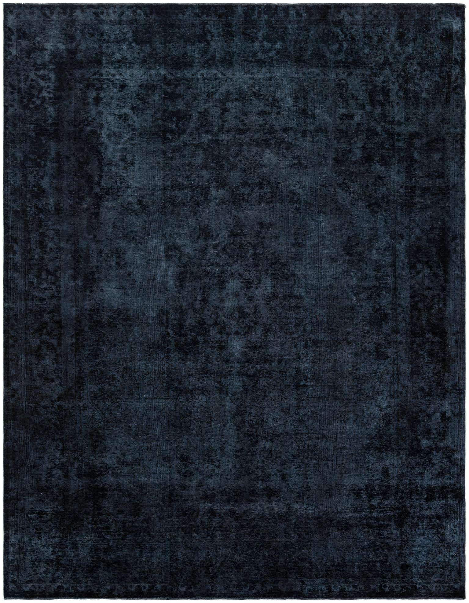 A large 10x13 rectangular black wool rug with a subtle distressed Persian medallion pattern, suitable for a living room.