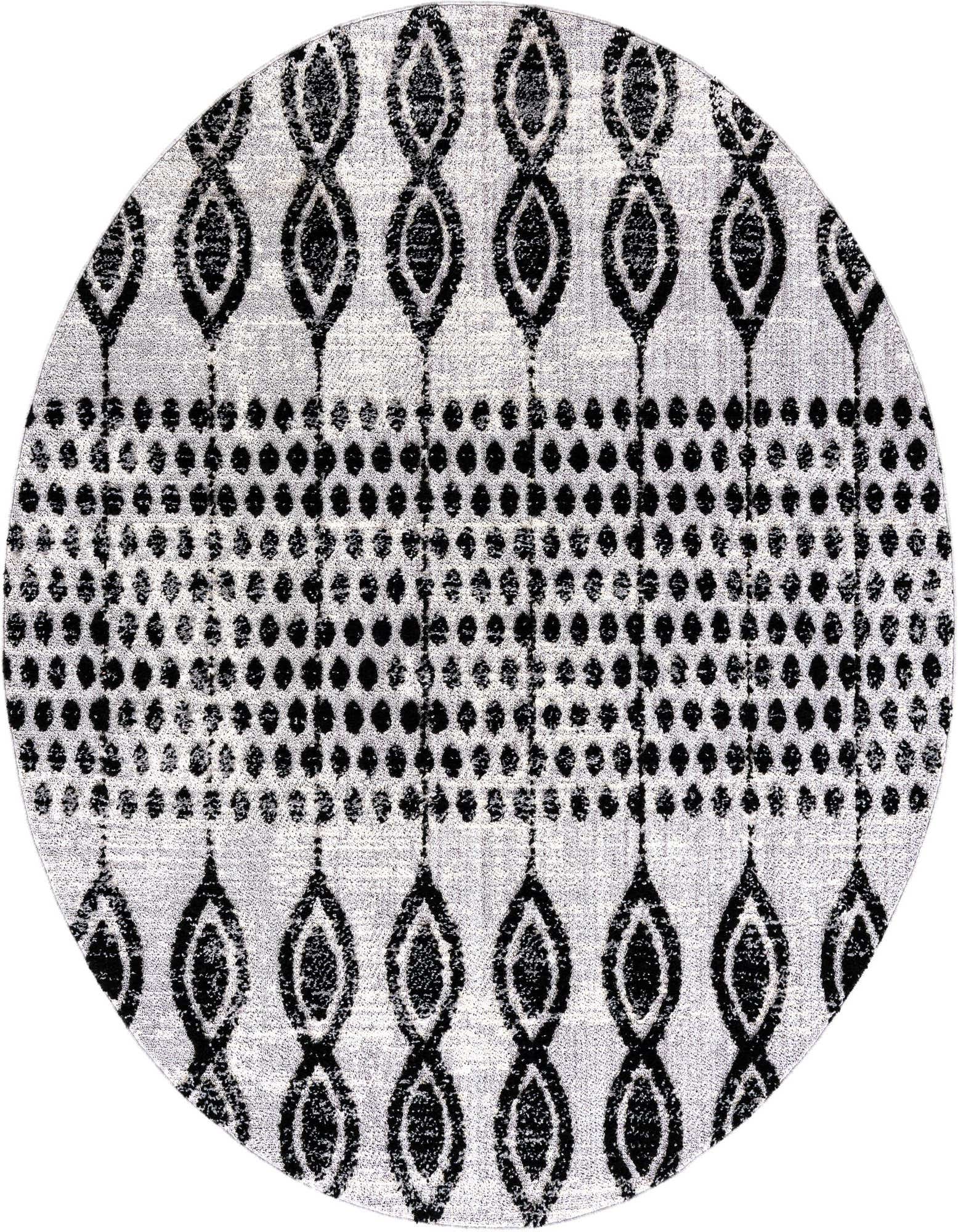 A 7' round black and white tribal rug with a modern abstract pattern featuring alternating rows of linked ovals and polka dots.