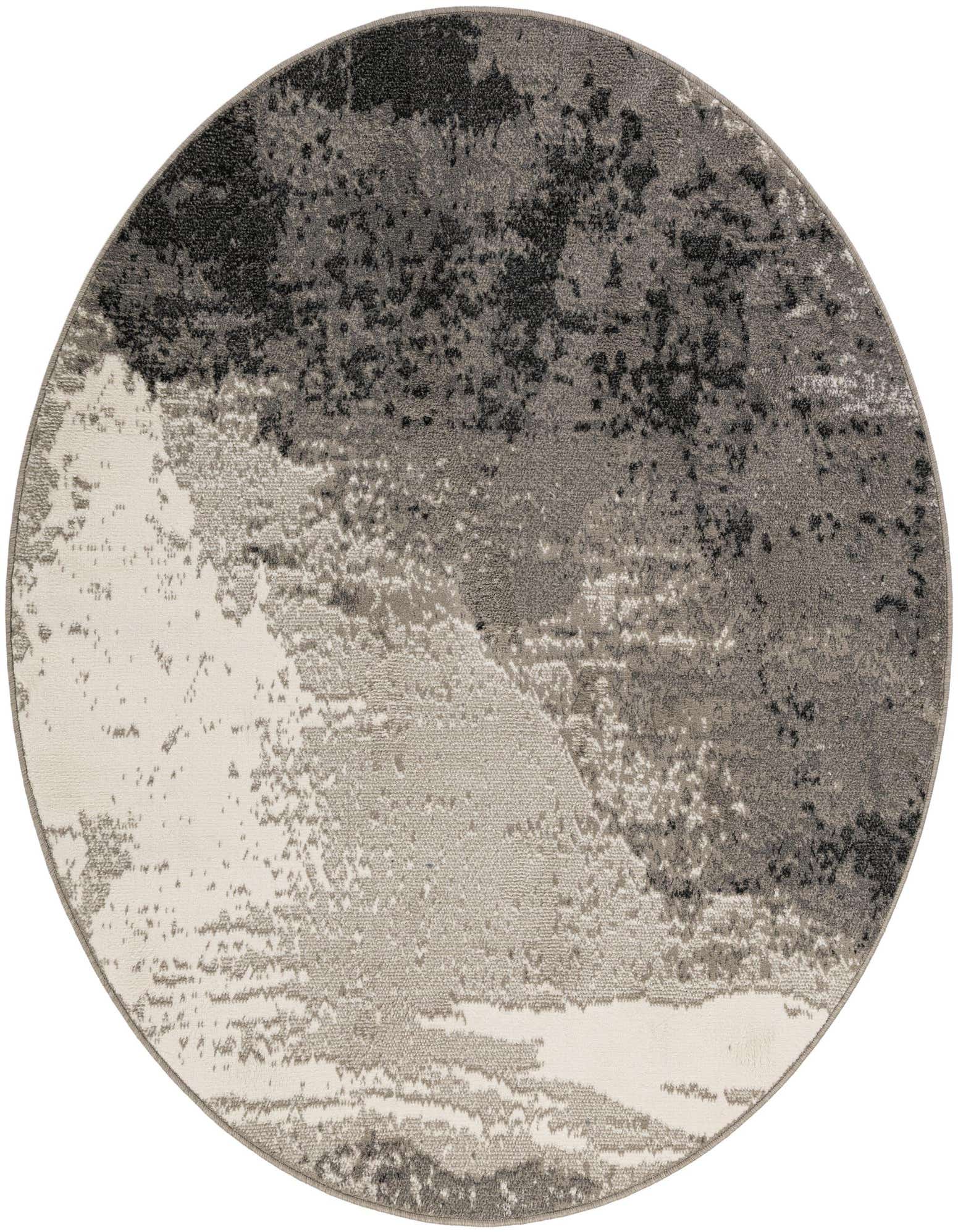 A 6' round modern abstract rug with a distressed pattern in shades of black, grey, and cream.