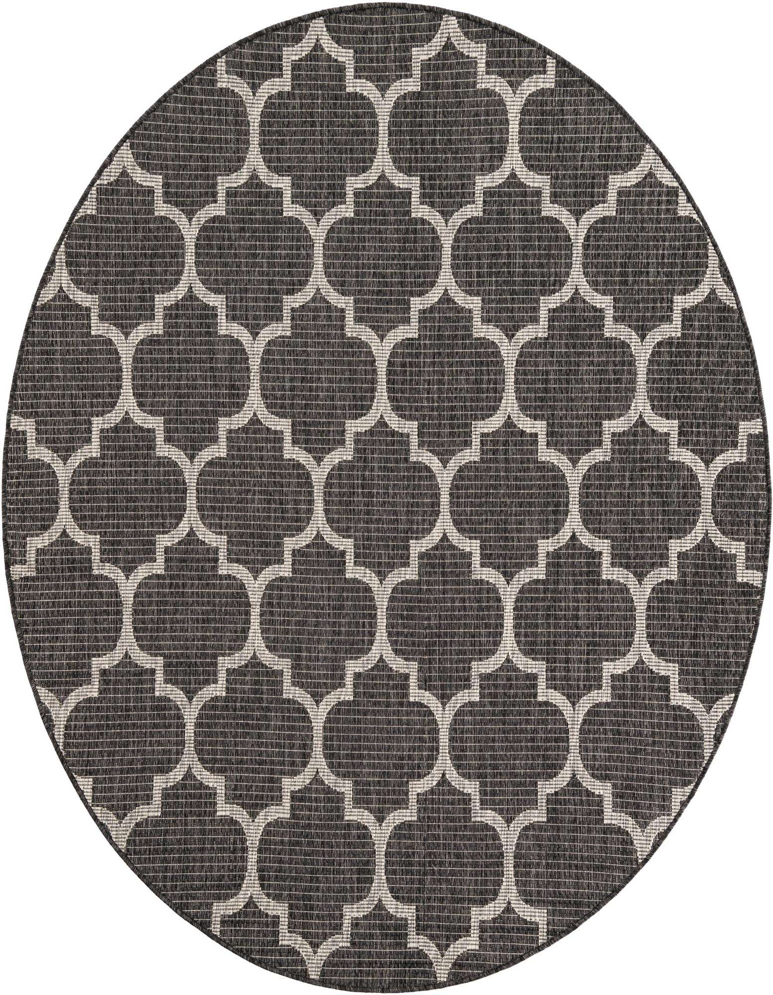 A 6' round black indoor/outdoor rug with a modern white quatrefoil lattice pattern, suitable for a patio.