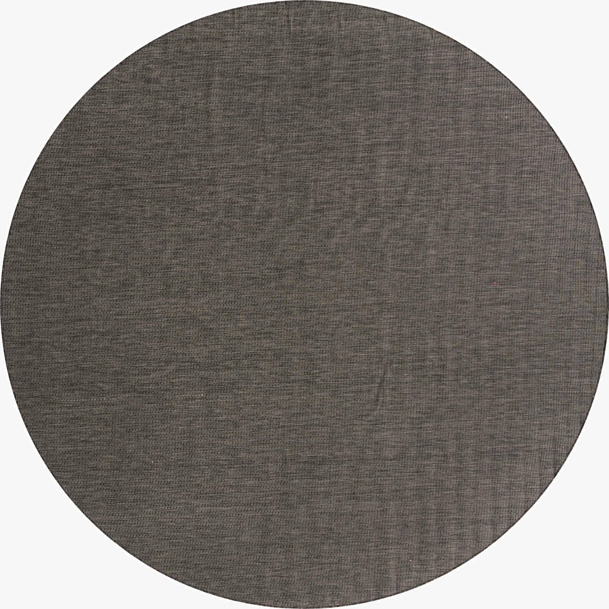 A large 13' round black indoor/outdoor rug with a subtle textured flatweave pattern, suitable for a patio.