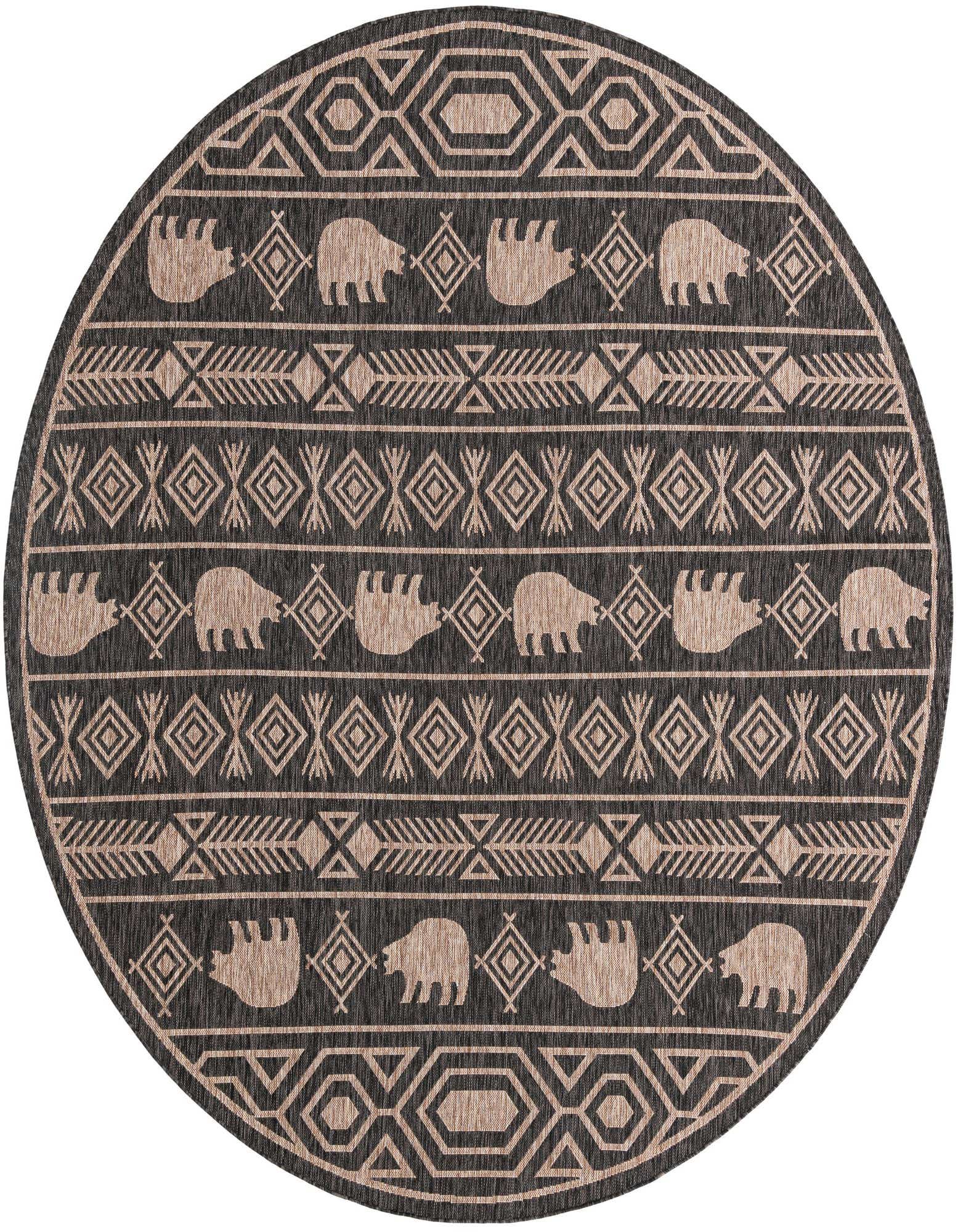 A 10' round black and beige tribal rug with bear and geometric patterns, suitable for indoor or outdoor use.