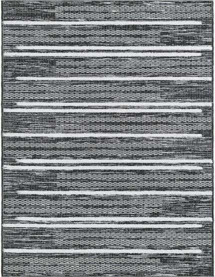 A 12 ft runner rug from the Abbey collection by Rugs.com, featuring a modern black and white striped pattern with textured high/low pile.