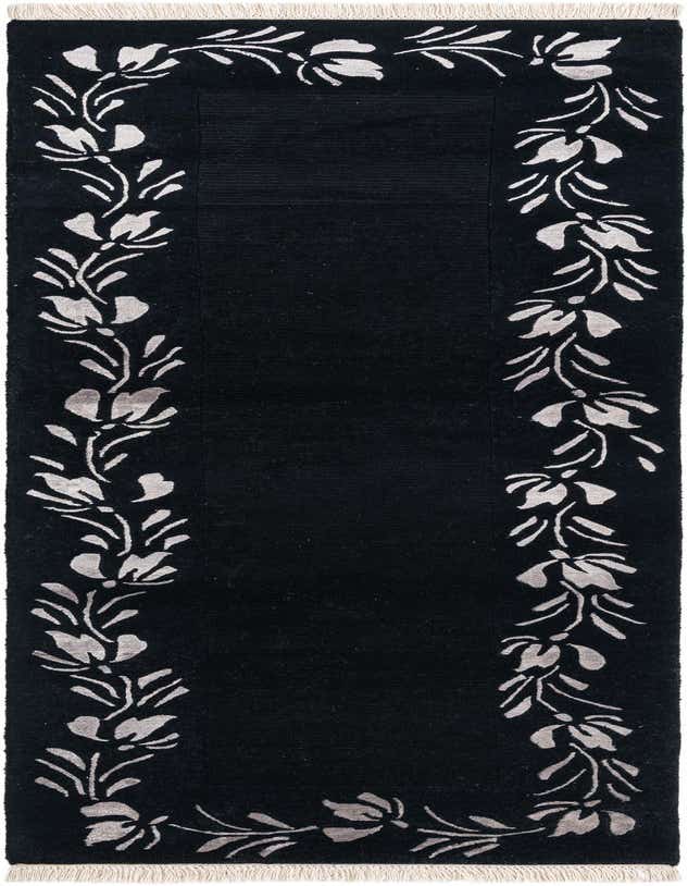 A black 8 ft runner rug with a modern floral pattern in light gray along both long edges, featuring white fringe.