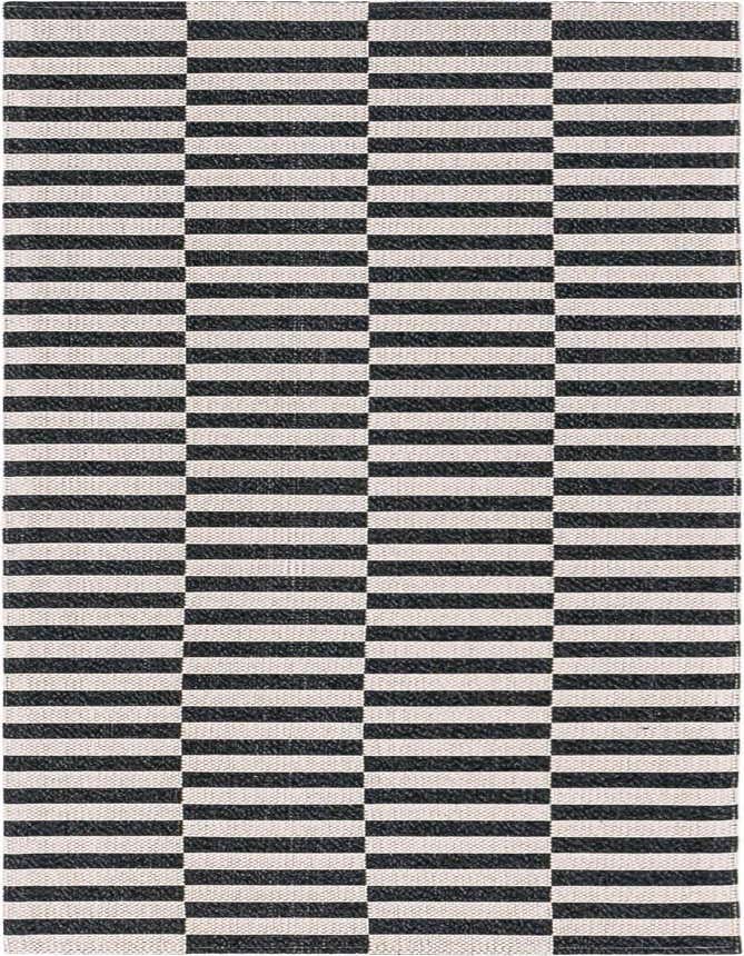 A 6 ft runner rug with a bold black and off-white striped geometric pattern, ideal for a modern hallway.