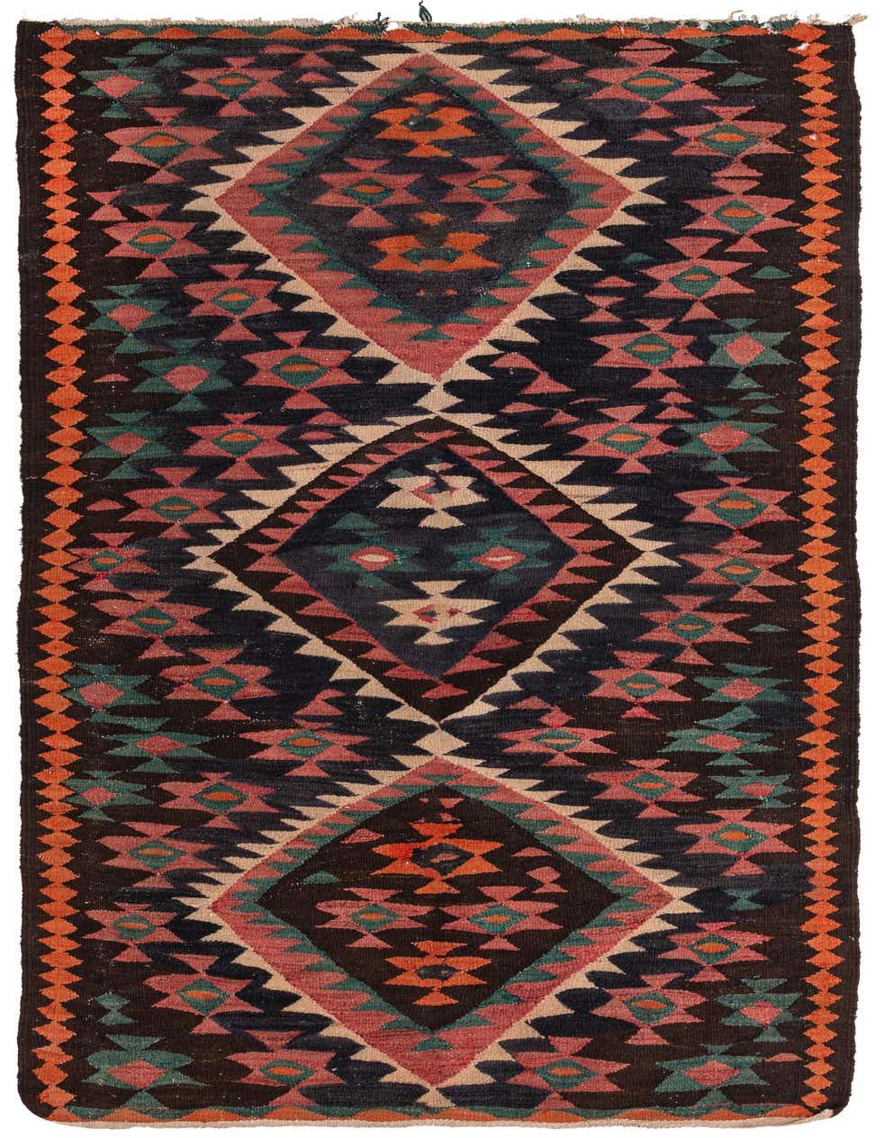 A 9 ft runner rug with a black background and a bold Southwestern geometric pattern in pink, orange, and teal.