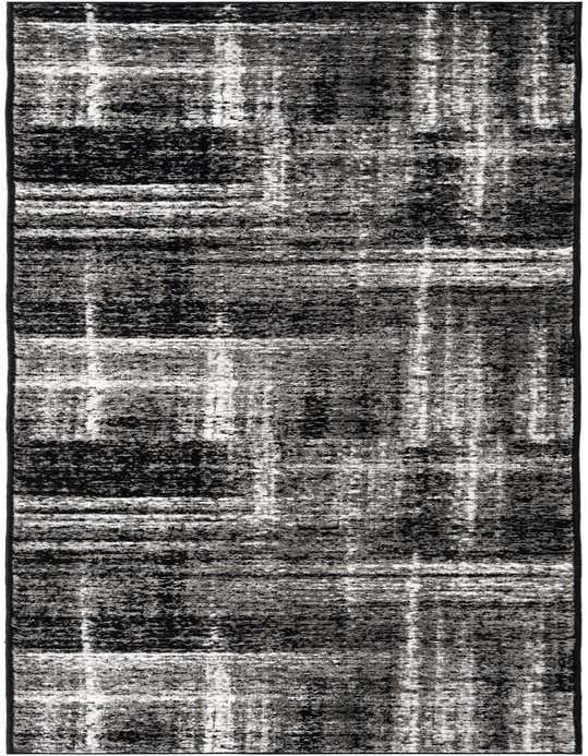 A 10 ft runner rug in black and grey with an abstract, distressed pattern, ideal for a hallway.