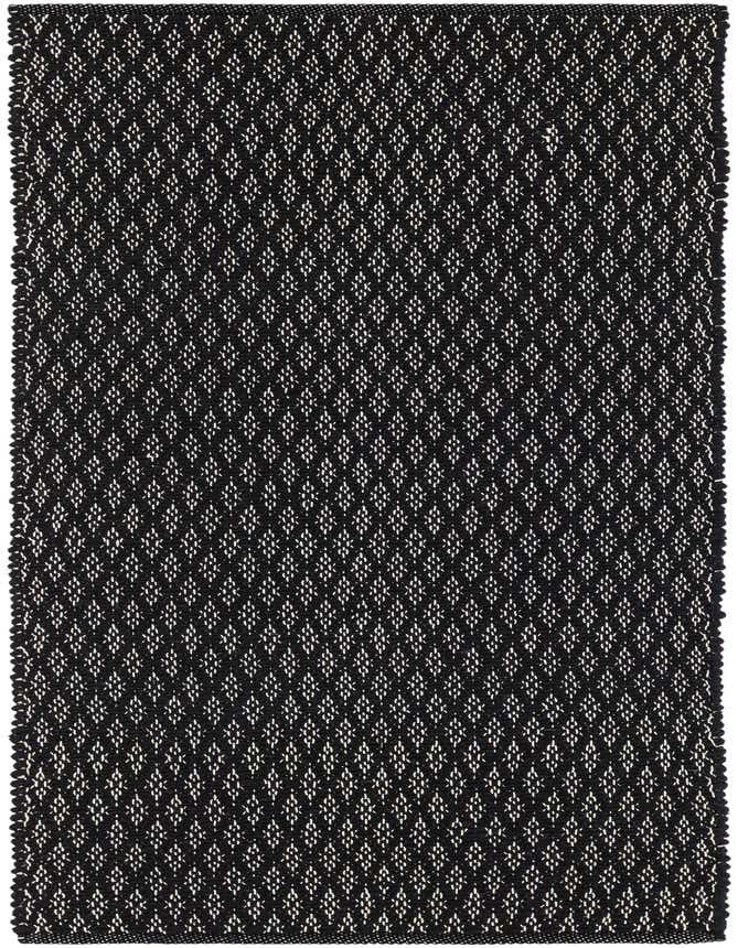A black 6 ft runner rug with a modern lattice pattern in white, featuring a textured flatweave.