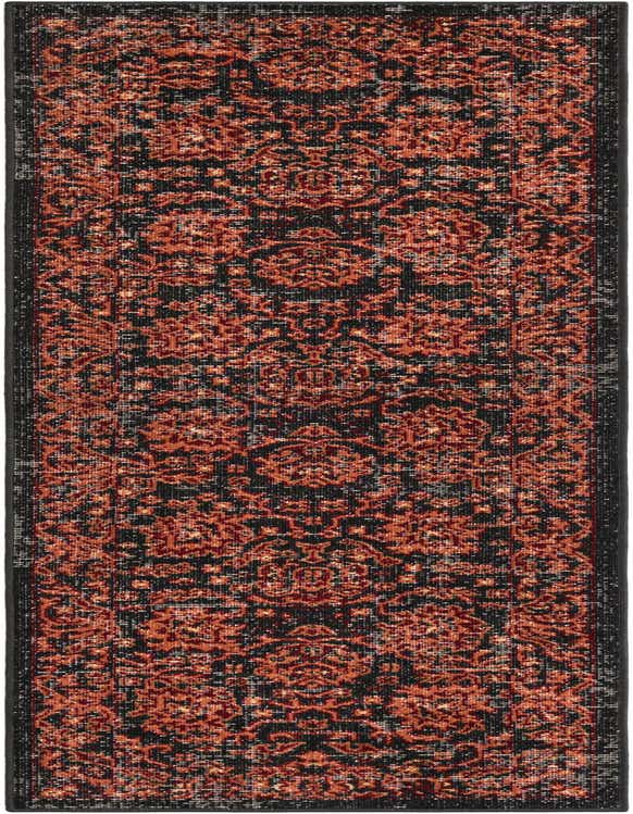 A 7 ft runner rug in black with a distressed, intricate orange and red traditional pattern, ideal for a hallway.