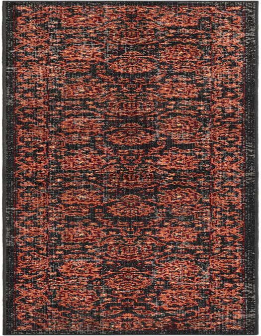 A long, narrow 8 ft runner rug featuring a distressed traditional pattern in black and various shades of orange and red.