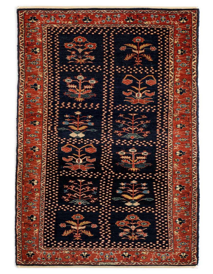 A 7 ft runner rug with a black field featuring colorful Persian floral motifs and a rust-red border, ideal for a hallway.
