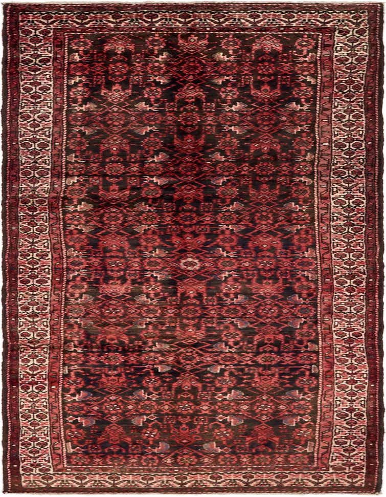 A 10 ft runner rug from the Malayer collection, featuring a traditional Persian tribal pattern in deep black and shades of red, ideal for a hallway.