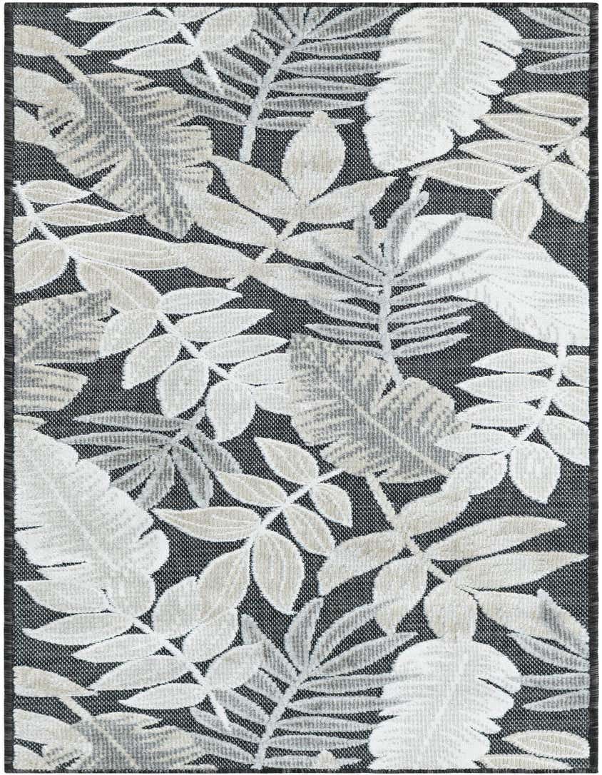 A black runner rug with a tropical leaf pattern in shades of white, grey, and beige, suitable for a hallway or patio.