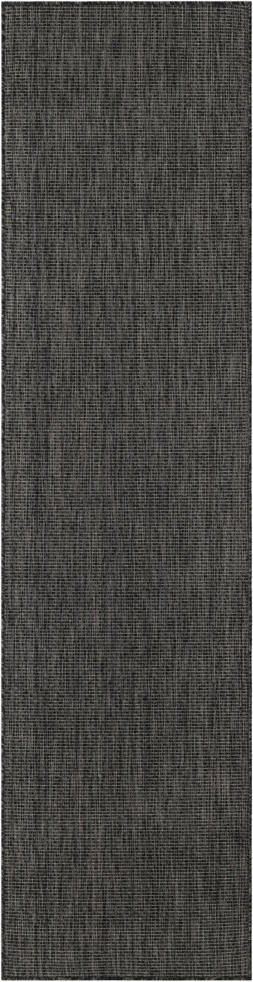 A 10 ft runner rug in a solid black, modern flatweave design, suitable for a hallway or patio.