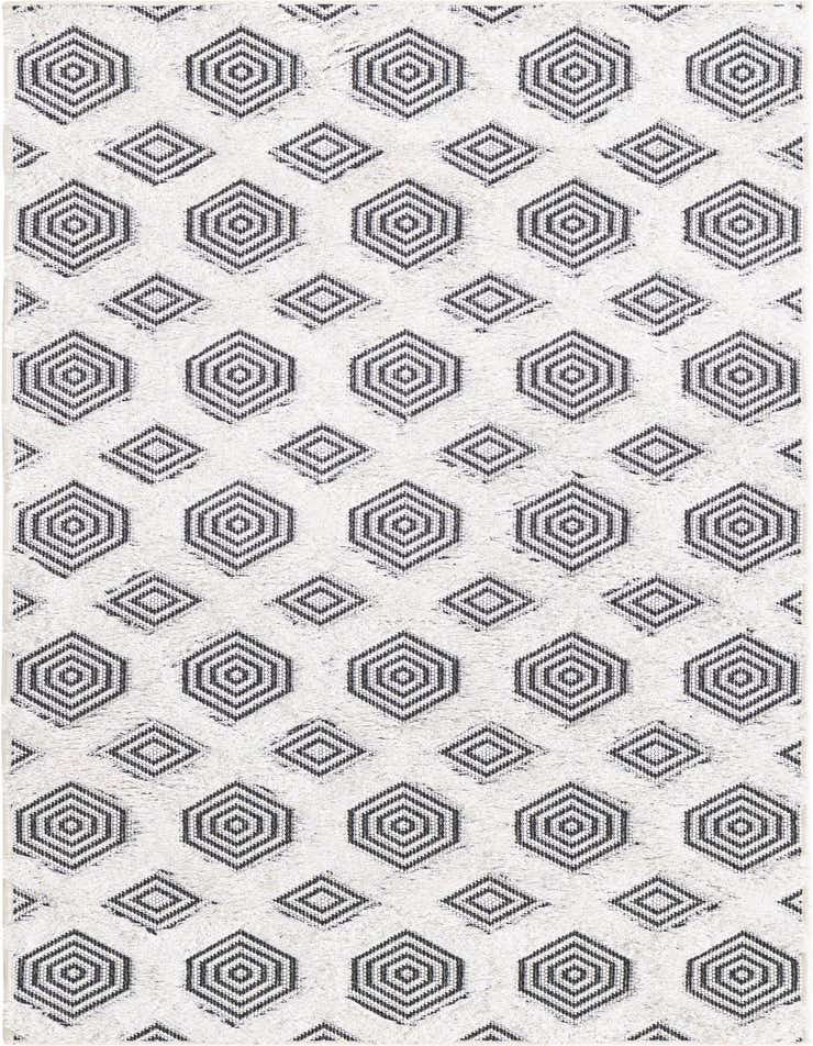 A 6 ft runner rug with a modern black and white abstract geometric pattern, featuring textured high pile.