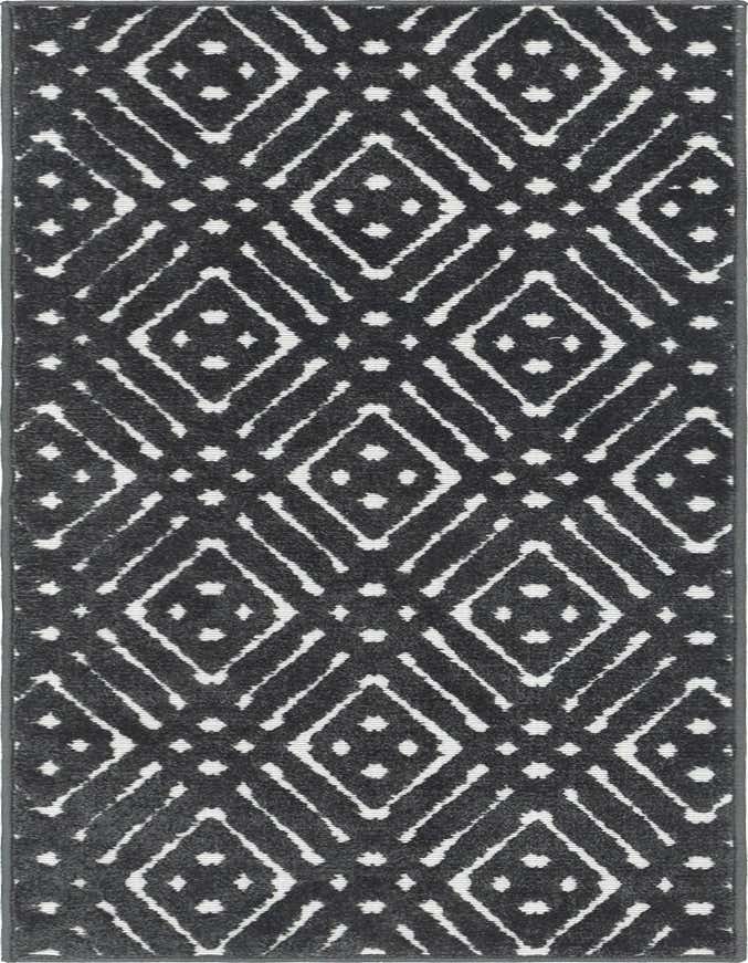 A 6 ft runner rug featuring a modern tribal trellis pattern in black and white, suitable for a hallway or patio.