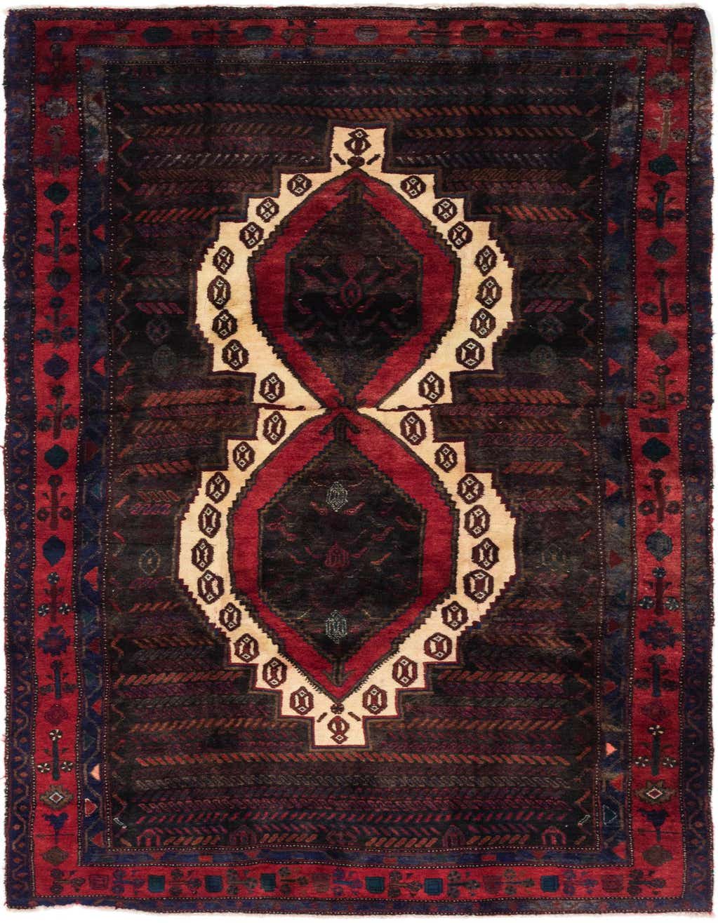 A 10 Ft runner rug with a black field, red border, and a prominent cream and red tribal medallion.