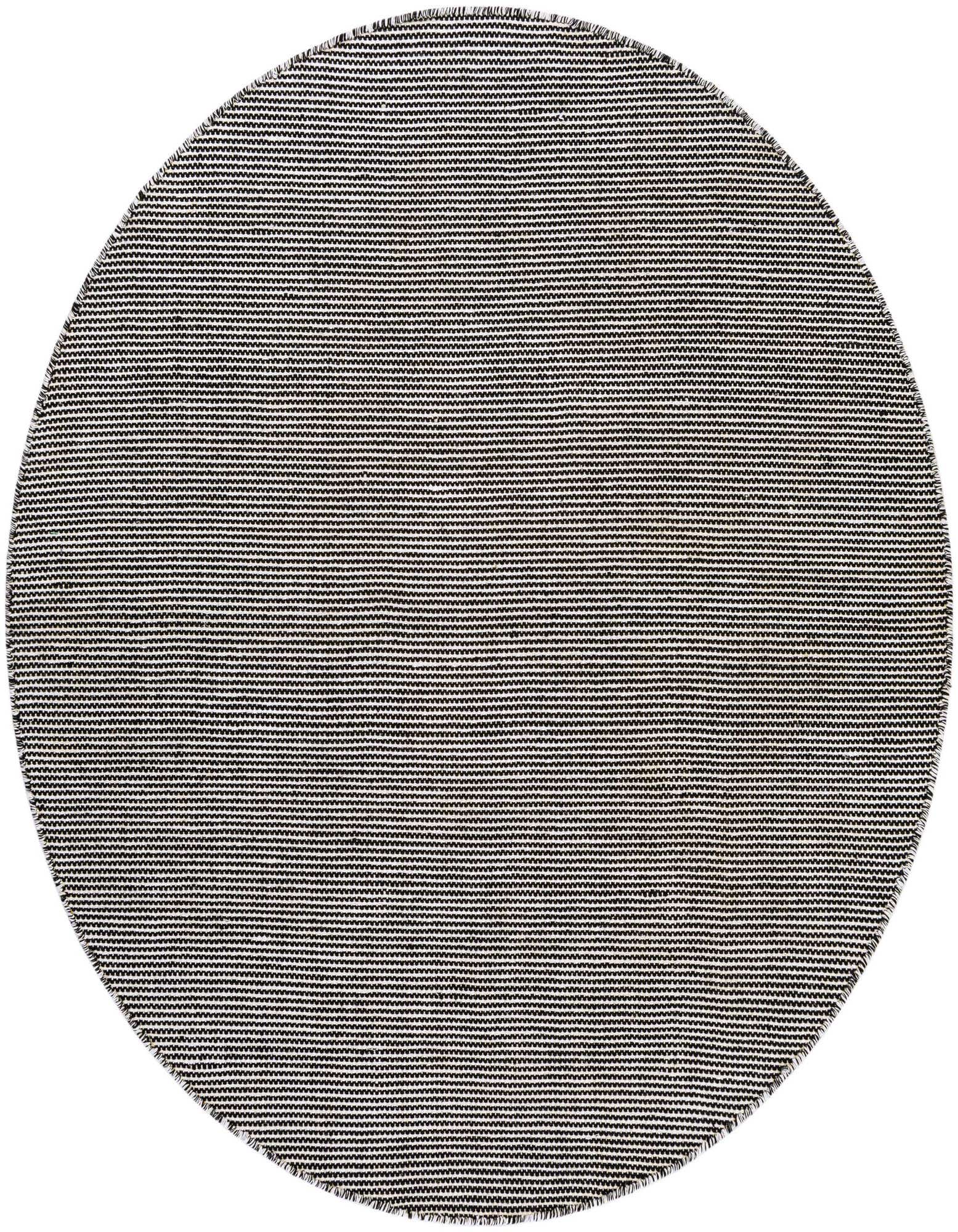 A 5' 1 round Jill Zarin Palm Springs Outdoor rug in Black Sky, featuring a textured modern flatweave pattern.