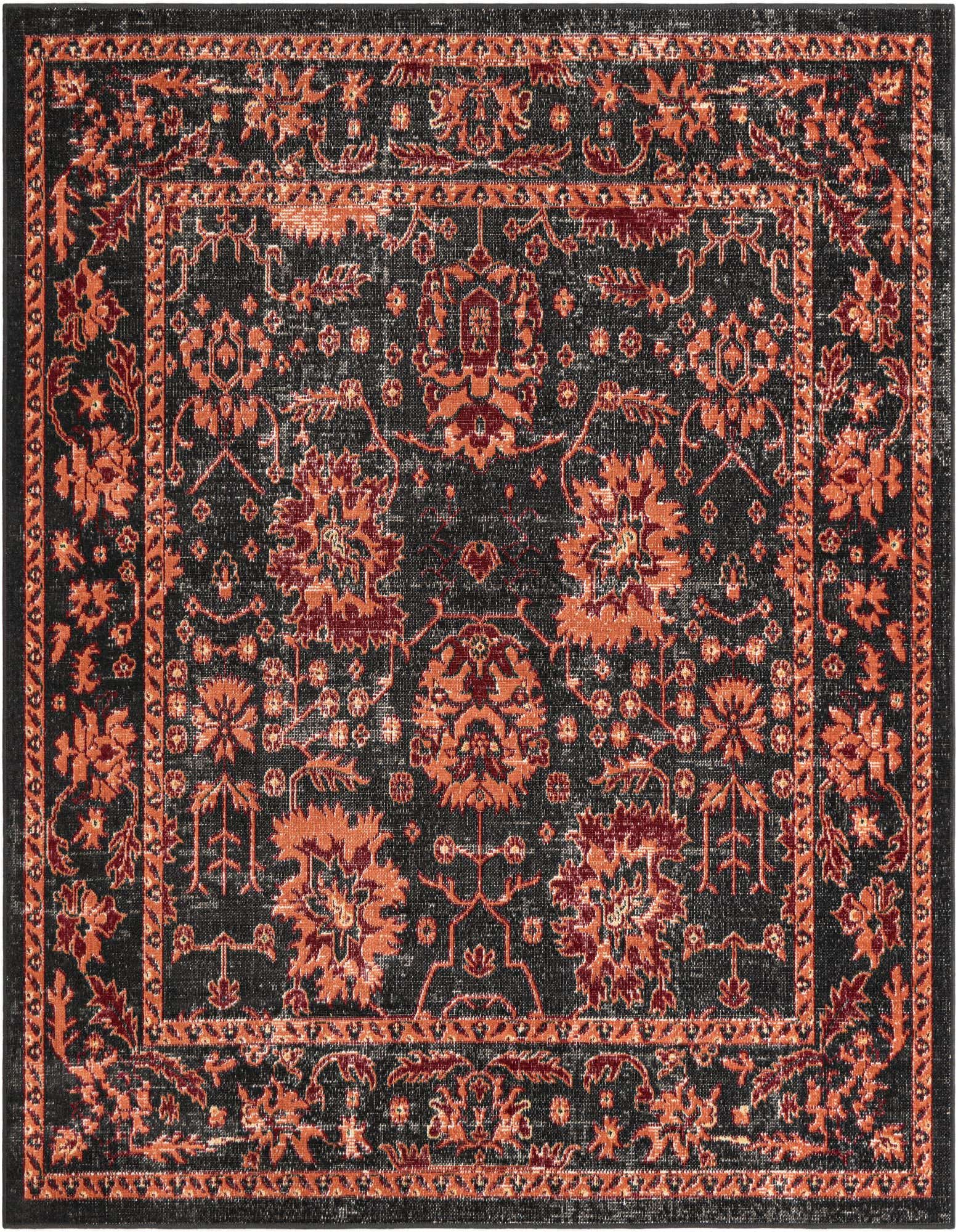 A square black rug with an ornate, distressed orange and red floral medallion pattern and border, suitable for a patio.