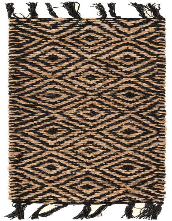 A black and natural jute stair runner rug with a diamond pattern and braided texture, featuring black tassels at each end.