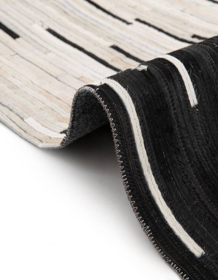 Detail image of  7' 10 x 7' 10 Cowhide Leather Round Rug