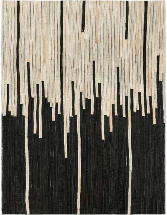 A modern 8 ft runner rug with an abstract black and ivory stripe pattern, ideal for a hallway or kitchen.