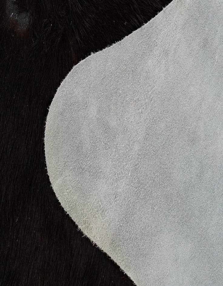 Detail image of  4' 5 x 5' 6 Cowhide Leather Freeform Rug