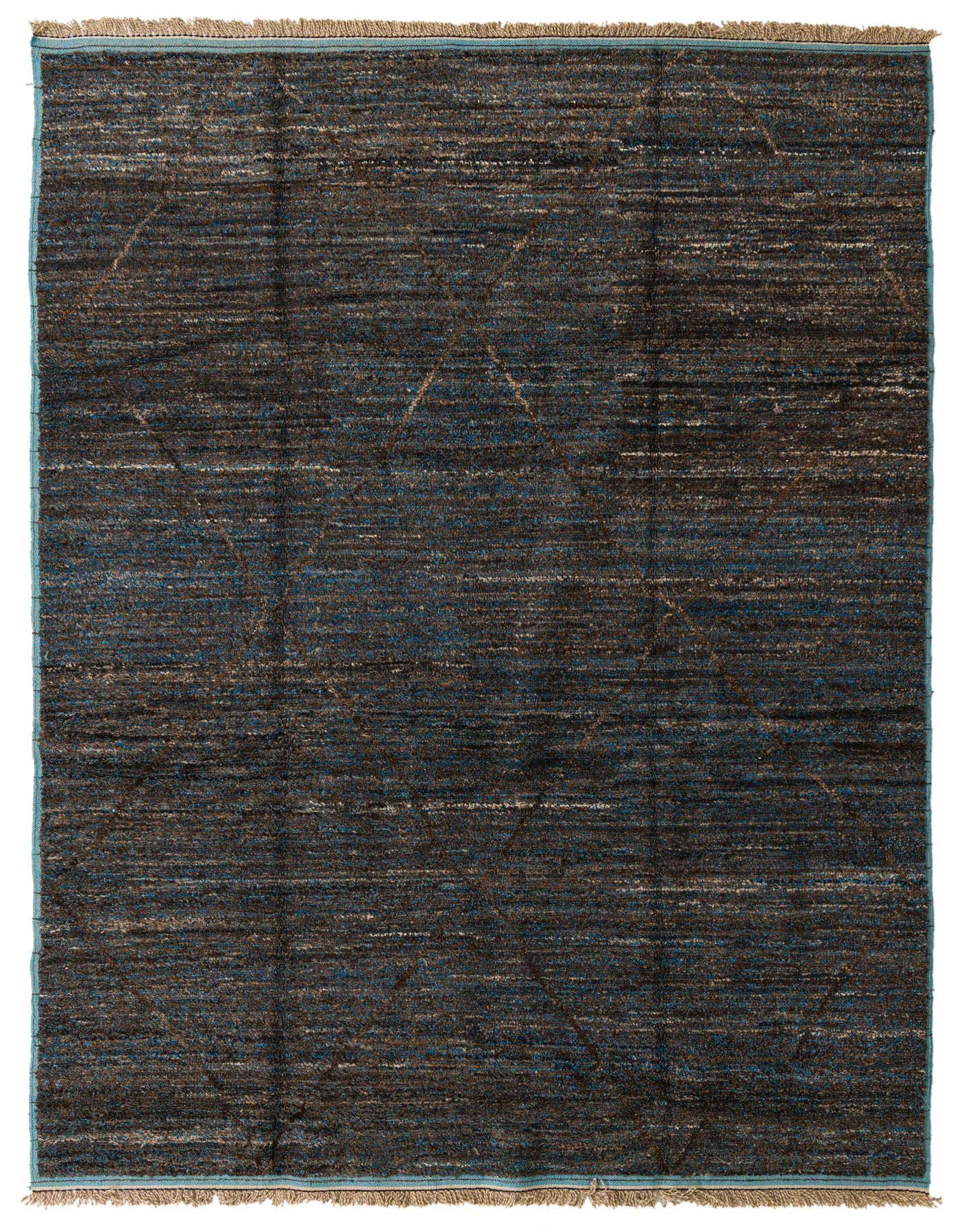 A 9x12 rectangular Moroccan shag rug in blues and browns, featuring a subtle abstract tribal pattern.