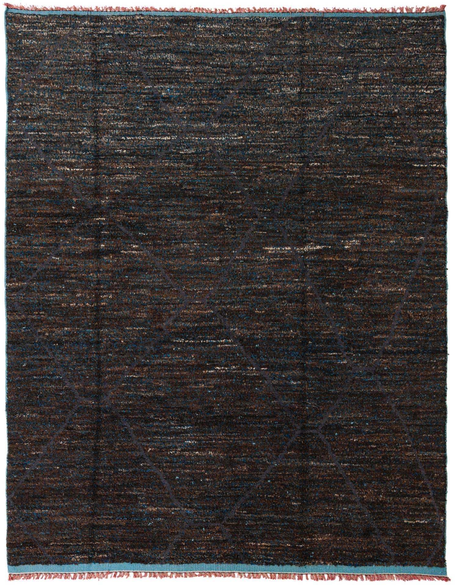 An 8x11 rectangular shag rug featuring a tribal pattern in various shades of blue and brown, suitable for a living room.