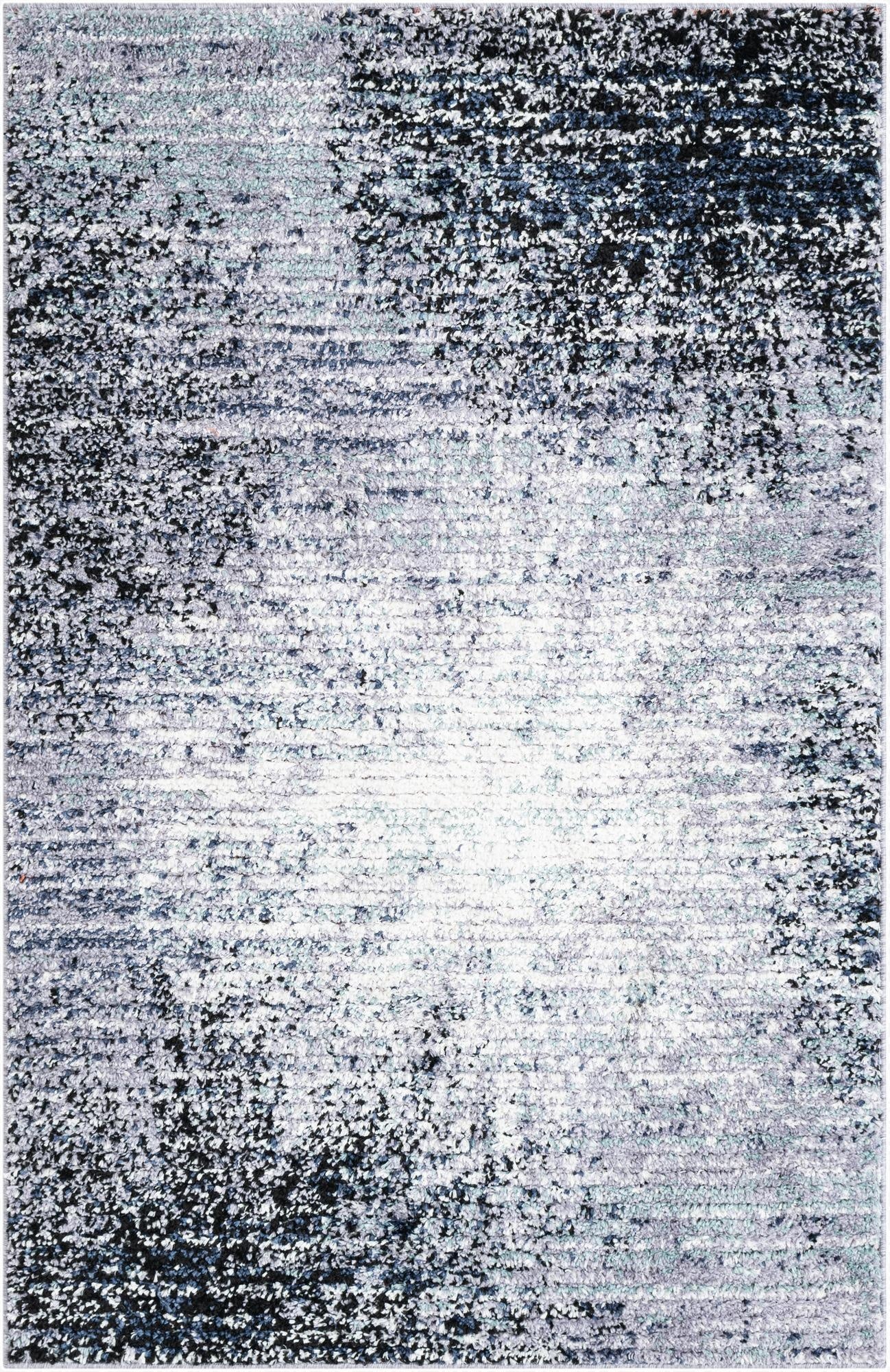 A 4x6 rectangular modern shag rug from the Tucson collection, featuring an abstract pattern in varying shades of blue and gray.