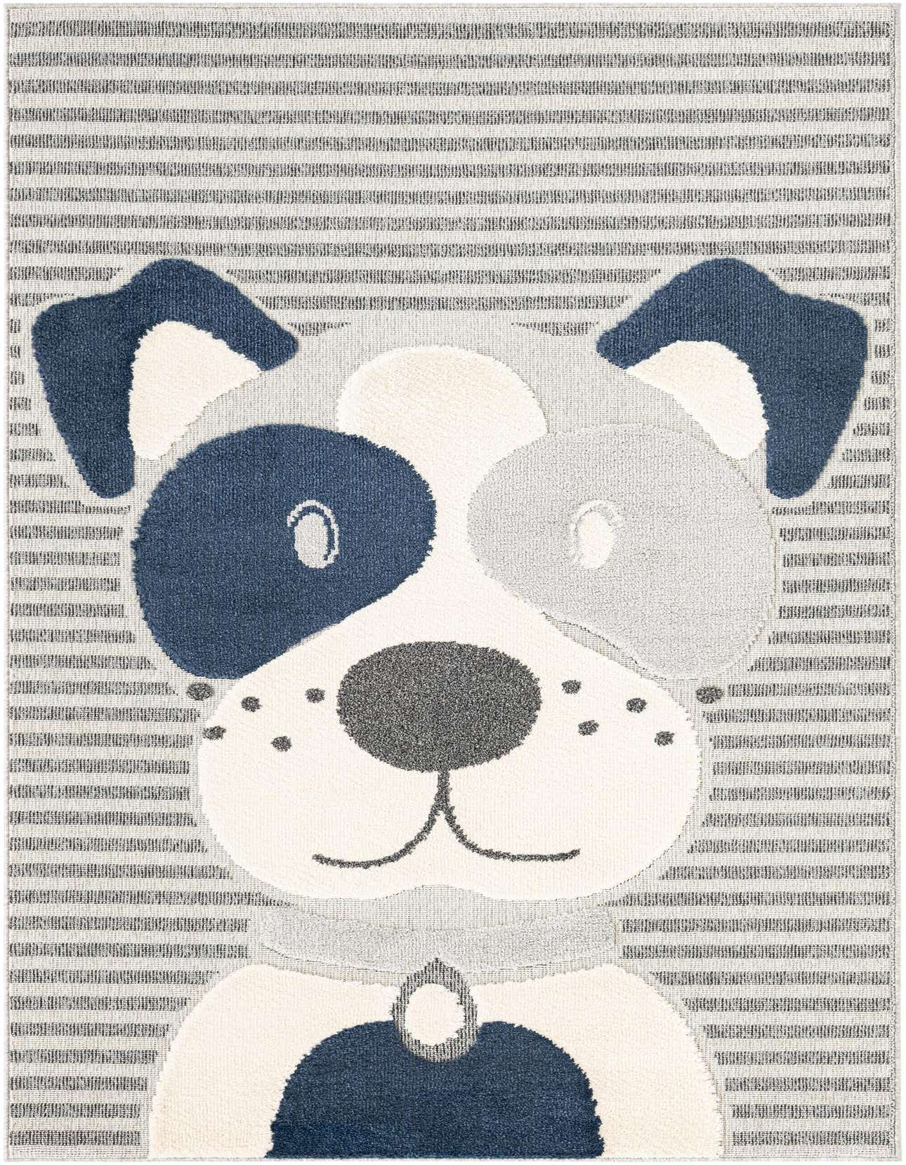 A rectangular 5x8 blue and gray area rug featuring a playful dog face design with one dark blue eye patch and a gray ear, set against a striped background.