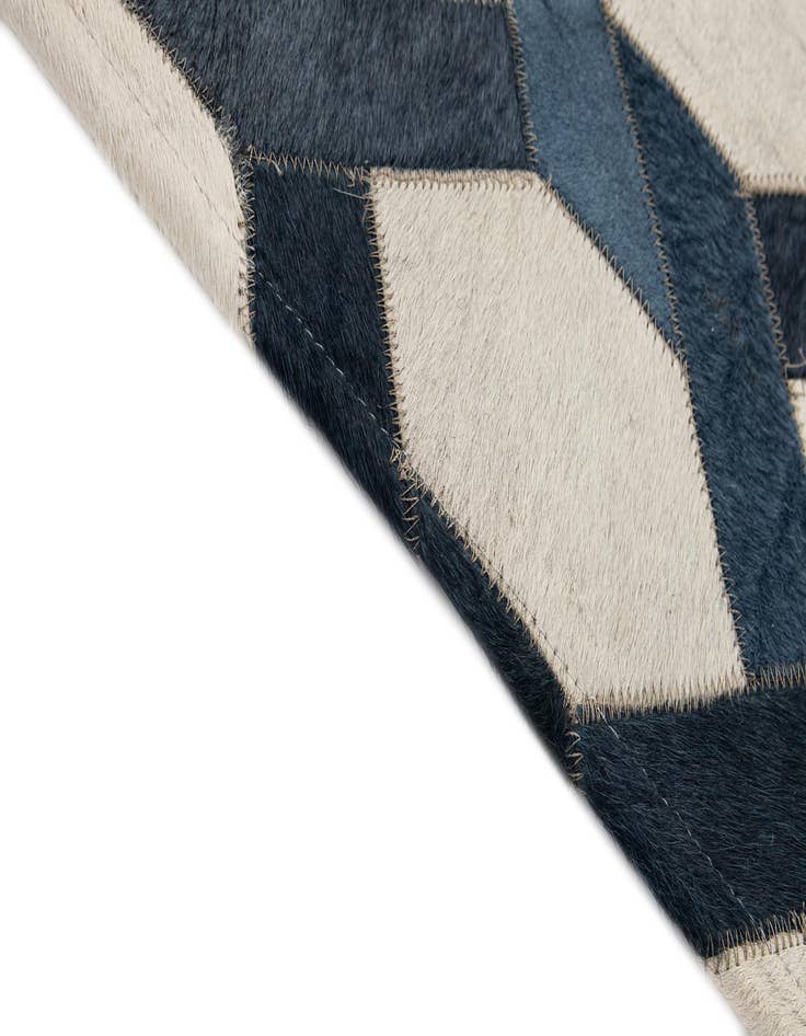 Detail image of  5' x 7' 11 Cowhide - Patchwork Rug
