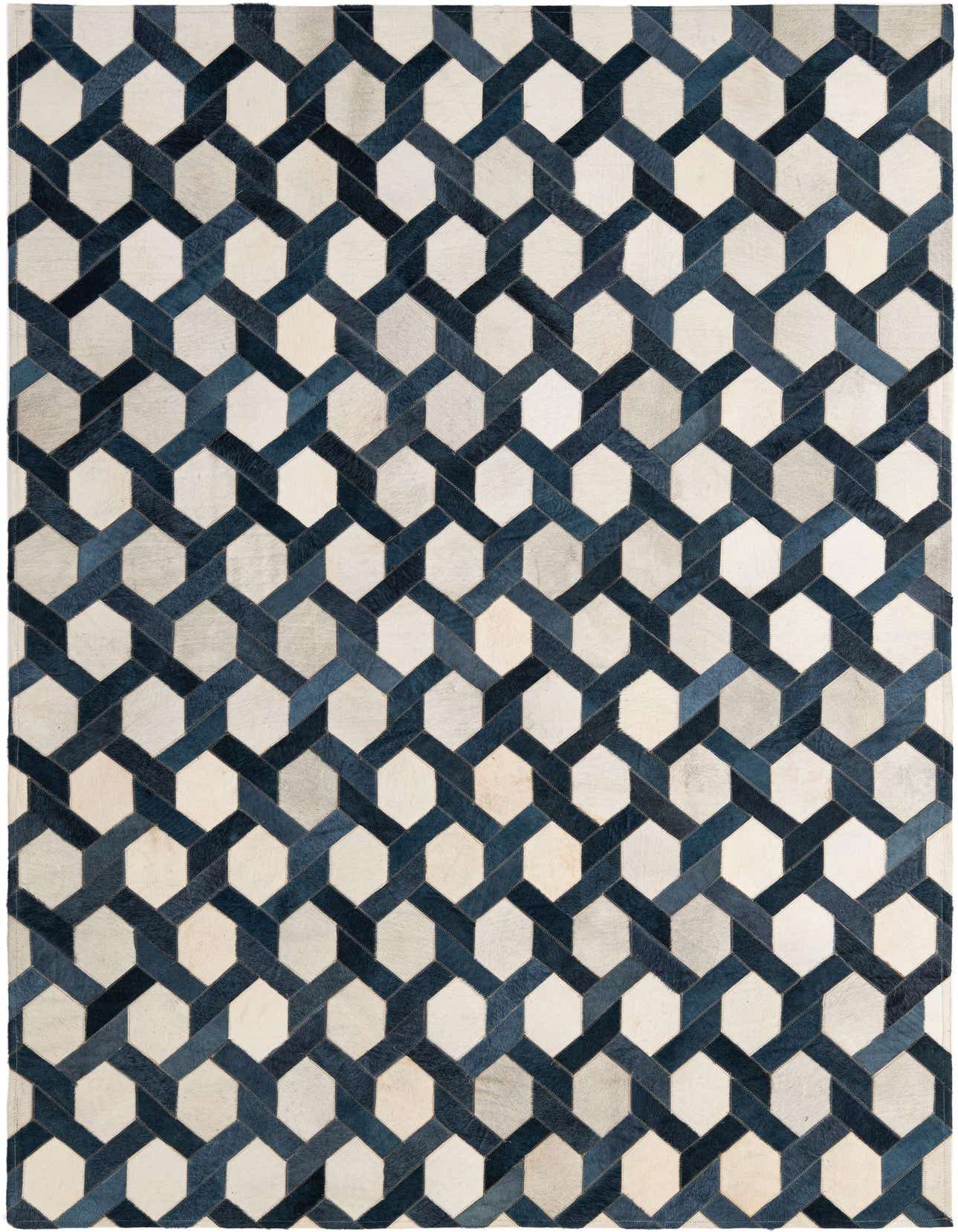 A 5x8 rectangular Cowhide - Patchwork rug featuring a modern geometric pattern in shades of blue, ivory, and cream.