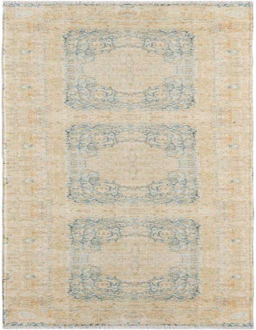 A long 8 ft runner rug with a distressed traditional medallion pattern in blues and ivories, suitable for a hallway.