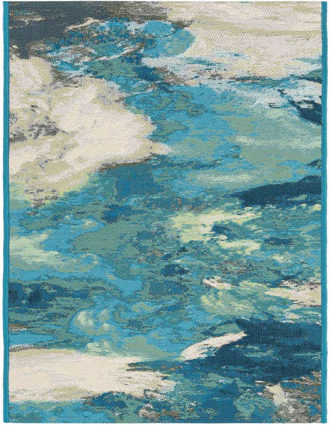 A 6 ft runner rug featuring an abstract, modern coastal design in various shades of blue, teal, ivory, and cream, suitable for indoor or outdoor use.
