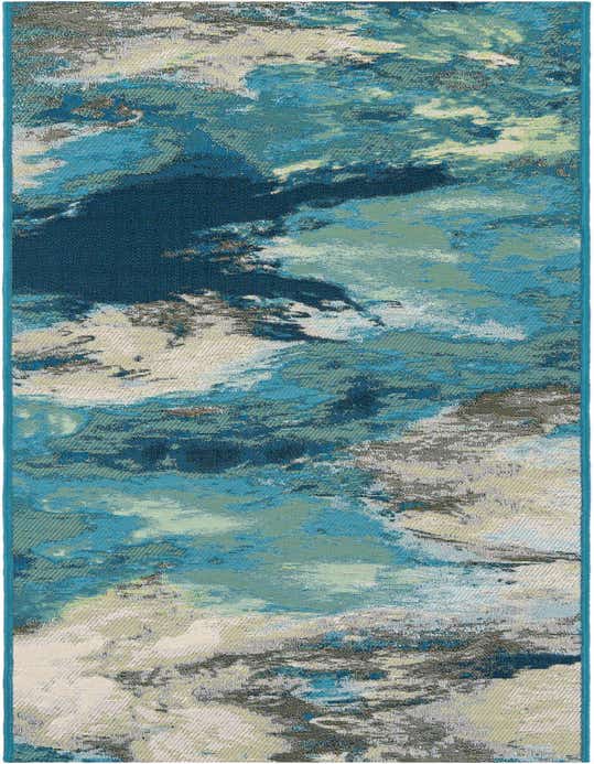 An 8 ft runner rug with an abstract, coastal-inspired pattern in shades of blue, ivory, and cream, suitable for a hallway or patio.